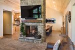 Lone Pine Lodge, Cozy Fireplace Divides Living Room and Dining Room